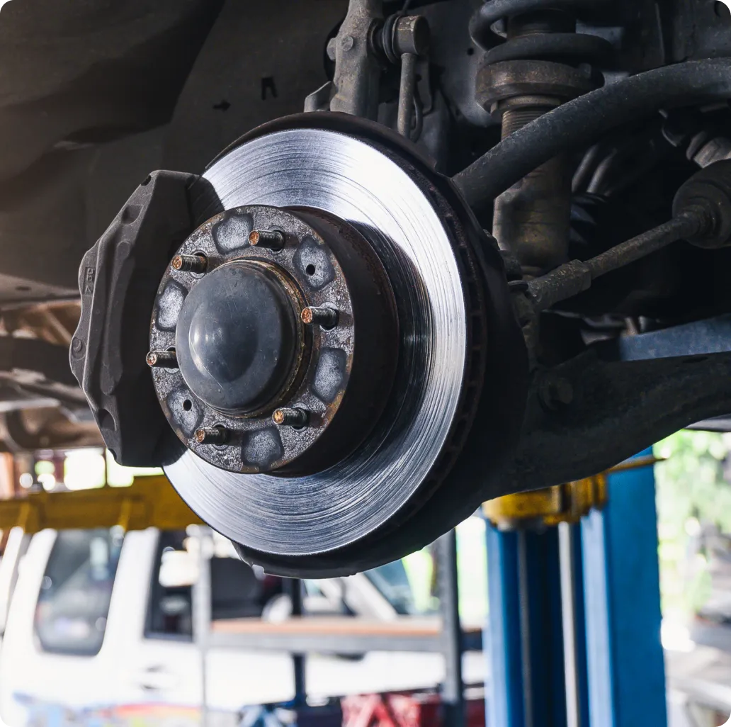 Brake Repair in Ipswich MA At New Meadows Motor Car. Close-up of brake rotor assembly