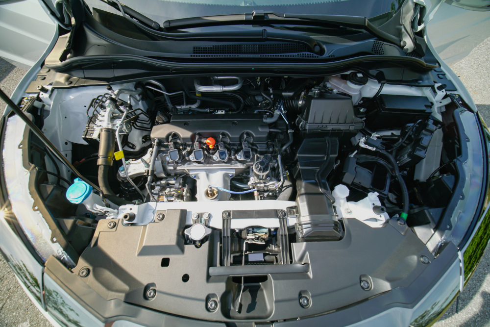 Engine Misfire, Engine Repair in Ipswich, MA At New Meadows Motor Car. Open car hood showing engine bay for misfire diagnosis and repair